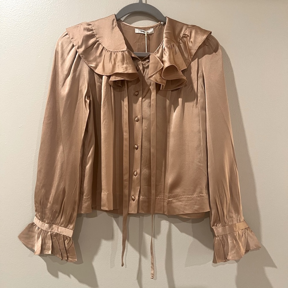 Silk blouse with romantic details, silk covered buttons, and so soft. NWT.